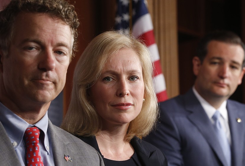 Sen. Kirsten Gillibrand, D-N.Y., Sen. Rand Paul, R-Ky., and Sen. Ted Cruz, R-Texas speak to reporters during a news conference about a bill regarding military sexual assault cases on Capitol Hill, Tuesday, July 16, 2013. (Photo by Charles Dharapak/AP)