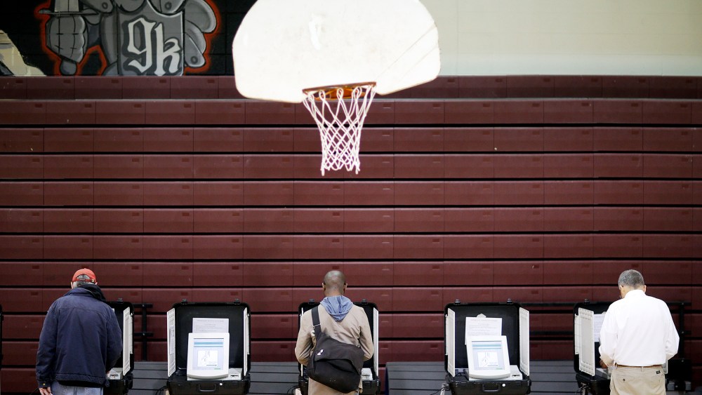 Voters cast their ballots at a polling site for Georgia's primary election, May 20, 2014, in Atlanta, Ga.