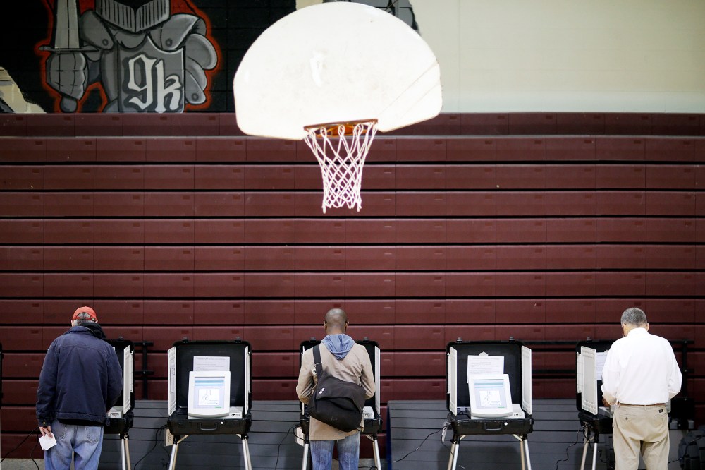 Voters cast their ballots at a polling site for Georgia's primary election, May 20, 2014, in Atlanta, Ga.