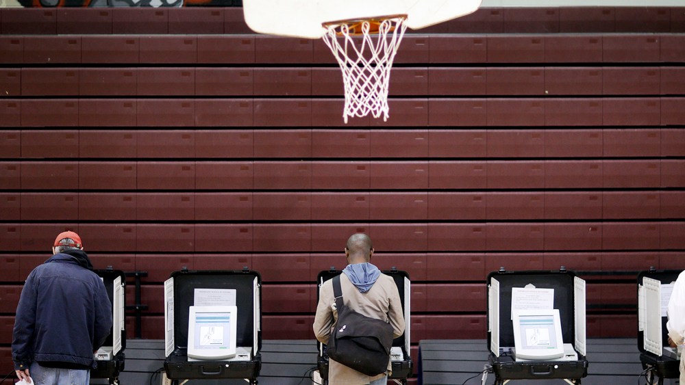 Voters cast their ballots at a polling site for Georgia's primary election, May 20, 2014, in Atlanta, Ga.