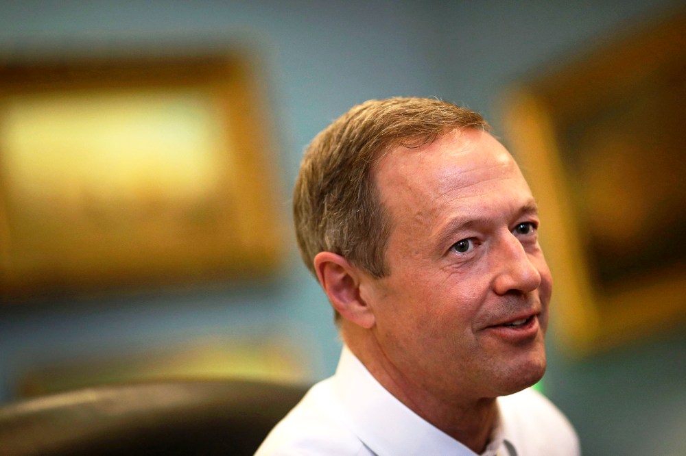 Maryland Gov. Martin O'Malley speaks with reporters in his office inside the Maryland State House in Annapolis, Md., April 7, 2014. (Photo by Patrick Semansky/AP)