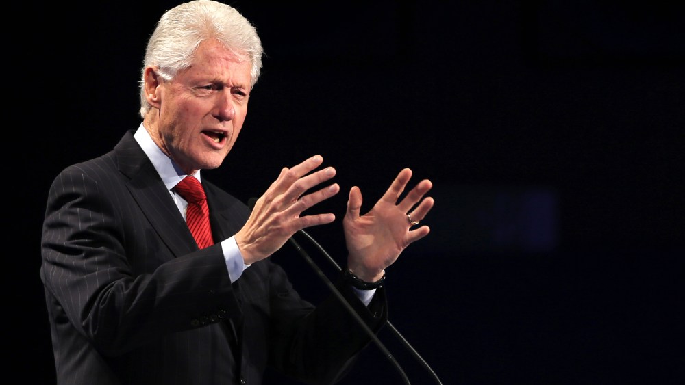 Former President of the United States Bill Clinton talks to the audience during the Global Teacher Prize ceremony in Dubai, United Arab Emirates, March 15, 2015. (Photo by Kamran Jebreili/AP)