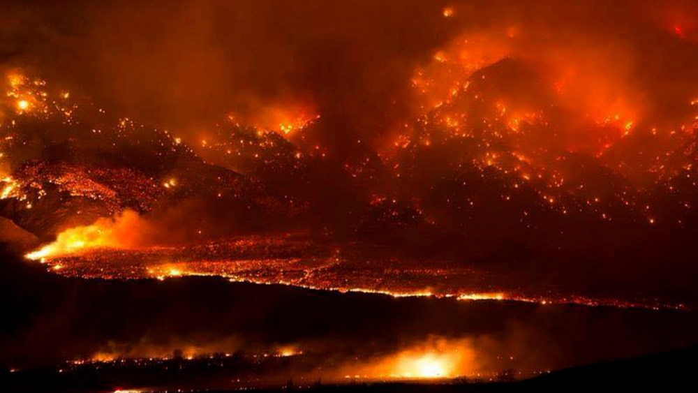 The Round fire burning at Wheeler Crest near Bishop Calif. Friday Feb. 6, 2015. The wildfire has destroyed 40 homes and forced about 150 people to leave two small California towns at the eastern base of the Sierra Nevada. (Photo by Jim Stimson/CalFire/AP)