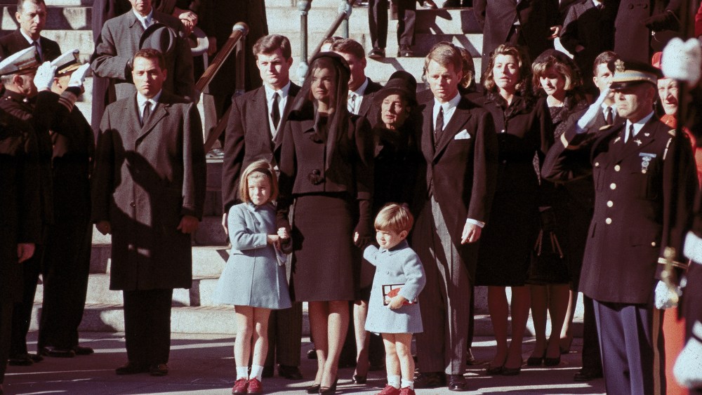 The First Family watches John F. Kennedy's funeral procession in Washington on Nov. 25, 1963.