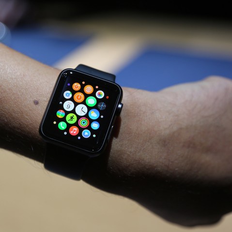 A visitor to an Apple presentation wears an Apple Watch in Cupertino, on Sept. 9, 2014.