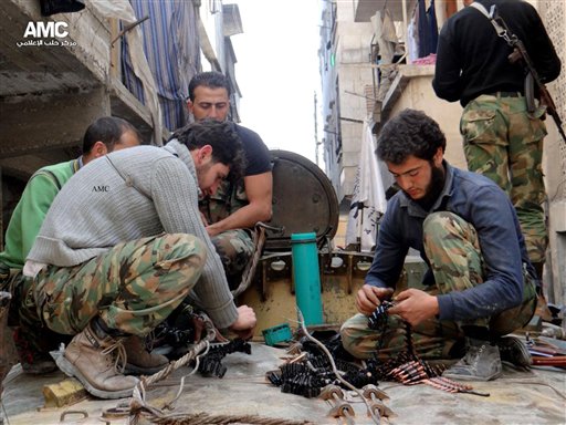 The Pentagon warns that greater aid to Syria's rebels may require thousands of soldiers and tens of billions of dollars. (AP Photo/Aleppo Media Center AMC, File)