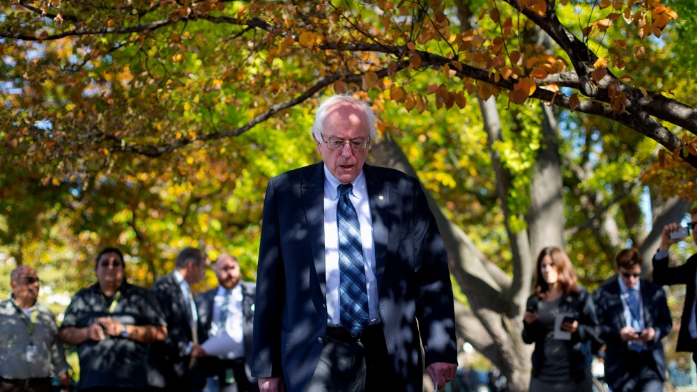 Democratic presidential candidate Sen. Bernie Sanders arrives for a new conference on Capitol Hill in Washington, Nov. 4, 2015, to announce a new climate legislation. (Photo by Pablo Martinez Monsivais/AP)