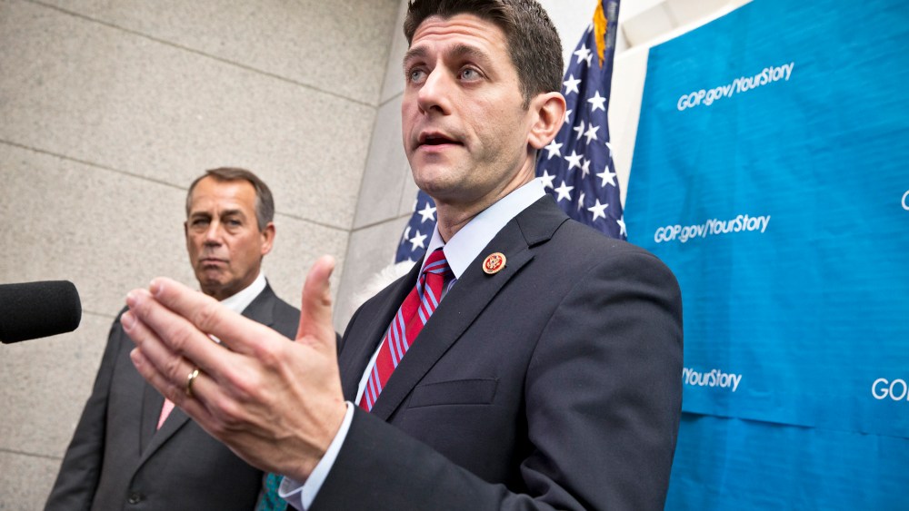 Paul Ryan takes reporters' questions as during a news conference on Capitol Hill, Dec. 11, 2013.