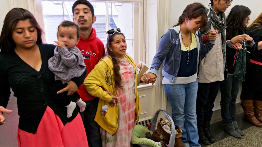 A group of young people from Arizona with undocumented parents gather outside the office of House Speaker John Boehner of Ohio, Tuesday, Oct. 22, 2013