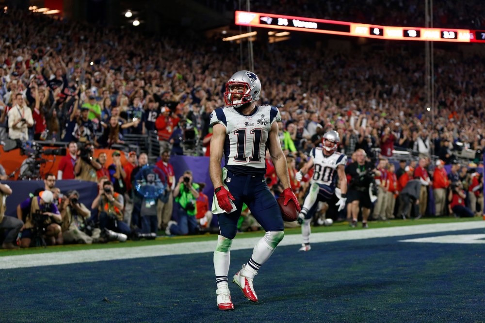 New England Patriots wide receiver Julian Edelman (11) celebrates after catching a touchdown pass against the Seattle Seahawks during Super Bowl XLIX at University of Phoenix Stadium on Feb. 1, 2015, in Glendale, Ariz.