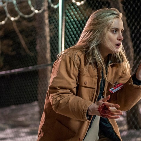 This image released by Netflix shows Taylor Schilling in a scene from "Orange is the New Black."