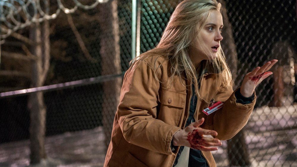 This image released by Netflix shows Taylor Schilling in a scene from "Orange is the New Black."