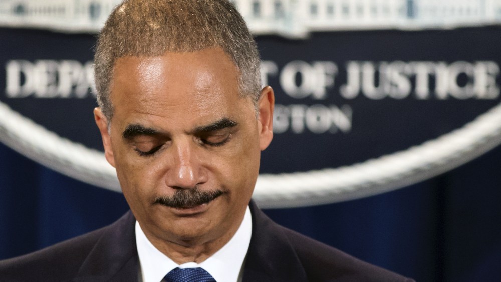 Attorney General Eric Holder expresses disappointment in the Supreme Court's 5-4 ruling in the Alabama voting rights case, Shelby County v. Holder, Tuesday, June 25, 2013, at the Justice Department in Washington. The court declared unconstitutional a...