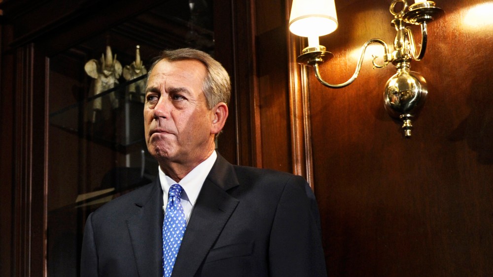 House Speaker John Boehner listens during a news conference at the Republican National Committee offices in Washington, Oct. 23, 2013.