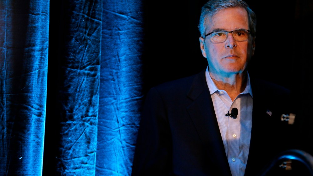 Former Florida Gov. Jeb Bush waits backstage before speaking at the Iowa Agriculture Summit, March 7, 2015, in Des Moines, Ia. (Photo by Charlie Neibergall/AP)