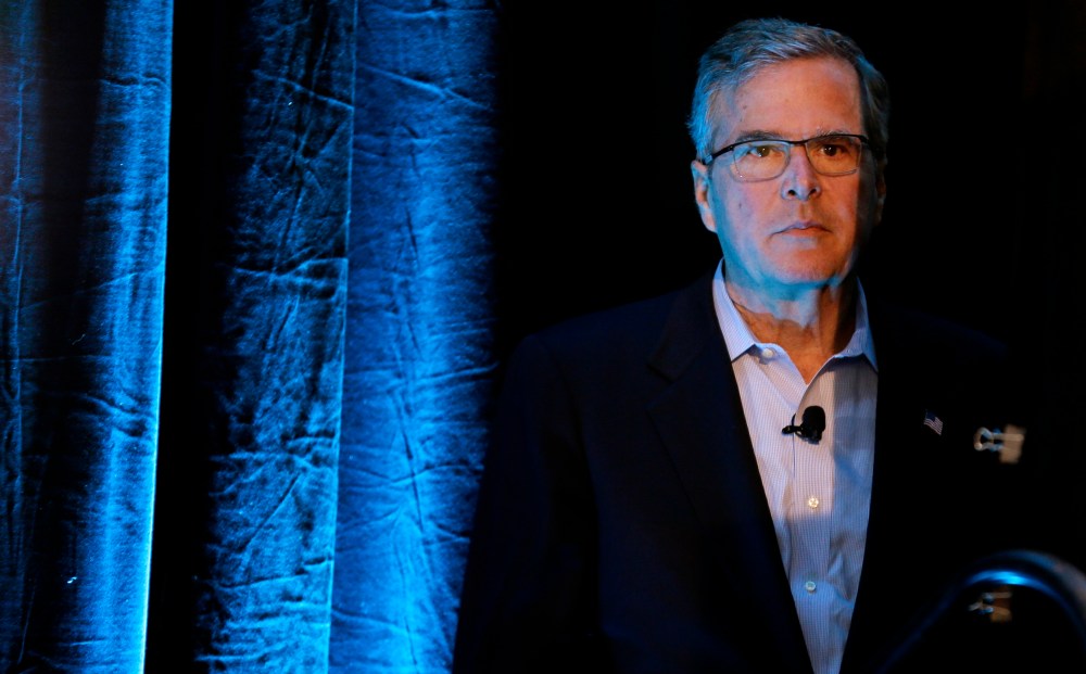 Former Florida Gov. Jeb Bush waits backstage before speaking at the Iowa Agriculture Summit, March 7, 2015, in Des Moines, Ia. (Photo by Charlie Neibergall/AP)