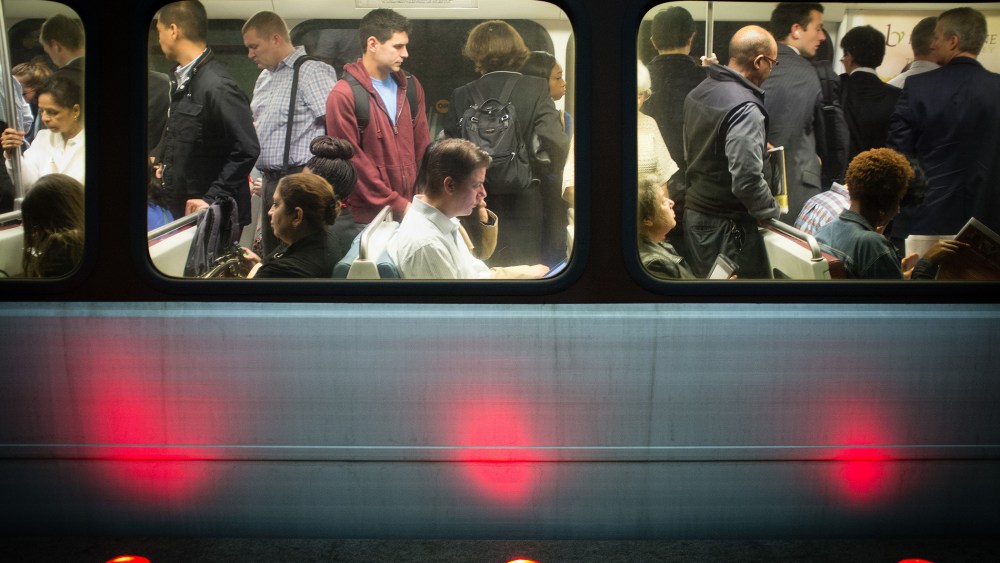 Passengers fill up Washington Metro subway cars in Arlington, Va., Oct. 17, 2013.