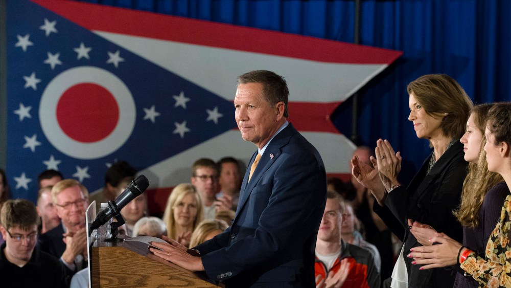Republican presidential candidate Ohio Gov. John Kasich smiles as he is applauded during a watch party at the Renaissance Columbus Downtown Hotel, March 8, 2016, in Columbus, Ohio. (Photo by John Minchillo/AP)