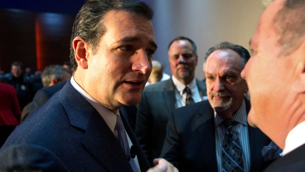 U.S. Sen. Ted Cruz (R-Texas) talks to supporters Friday, Oct. 25, 2013, after speaking at the Republican Party of Iowa's Reagan Dinner at the Iowa Events Center in Des Moines, Iowa.