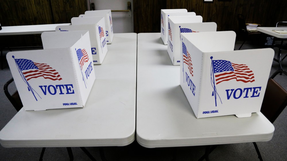 Voting booths await voters in Red Oak, Iowa, Tuesday, June 3, 2014, ahead of the Iowa primary elections.