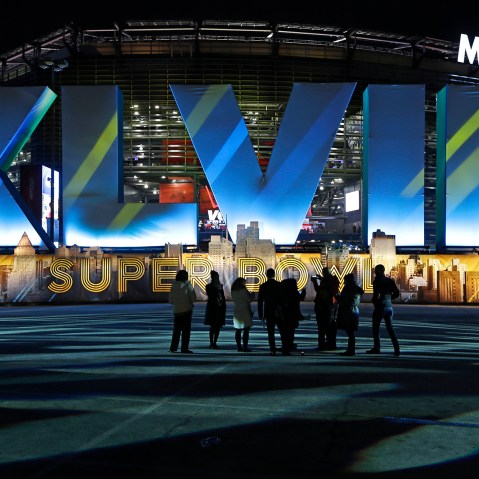 Fans walk near MetLife Stadium before the NFL Super Bowl XLVIII football game between the Seattle Seahawks and the Denver Broncos,Feb. 2, 2014, in East Rutherford, N.J.