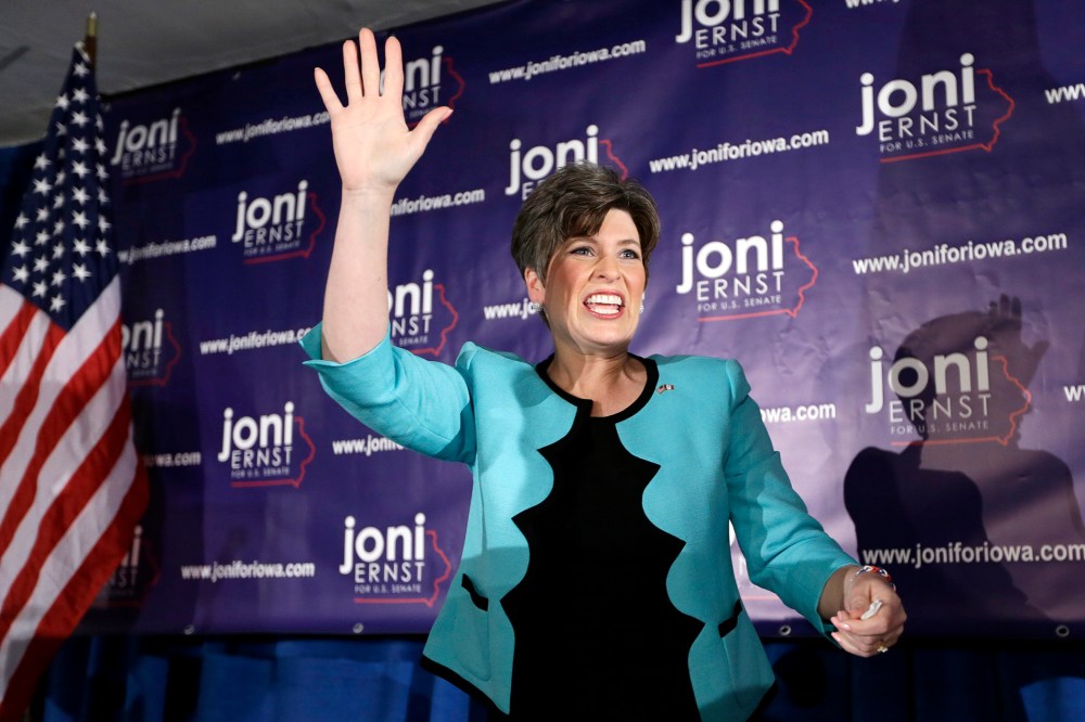 State Sen. Joni Ernst waves to supporters at a primary election night rally, June 3, 2014, in Des Moines, Iowa.
