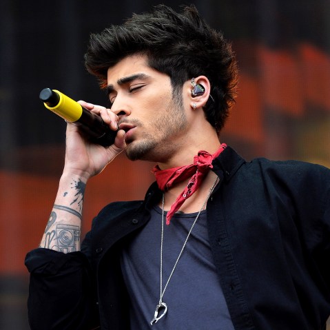 Zayn Malik of One Direction performs on stage on May 24, 2014 in Glasgow. (Photo by Mark Runnacles/PA Wire/AP)