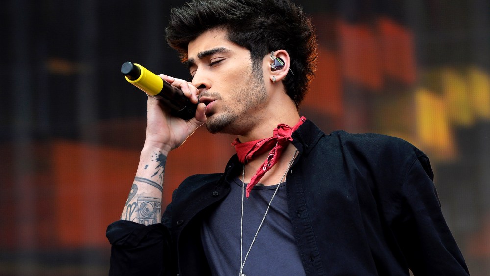 Zayn Malik of One Direction performs on stage on May 24, 2014 in Glasgow. (Photo by Mark Runnacles/PA Wire/AP)