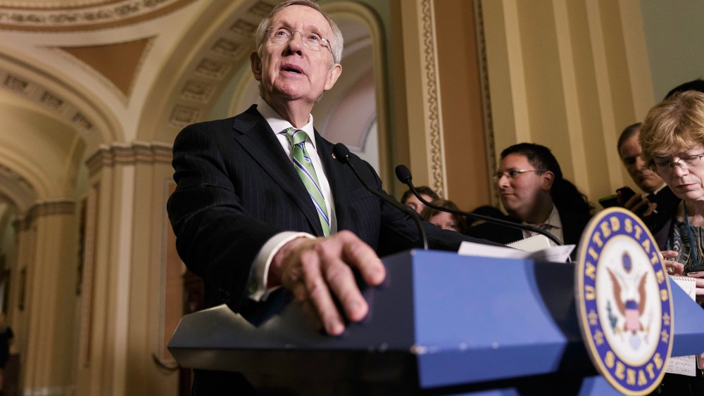 Senate Majority Leader Harry Reid of Nev. speaks to reporters on Capitol Hill in Washington, June 24, 2014.