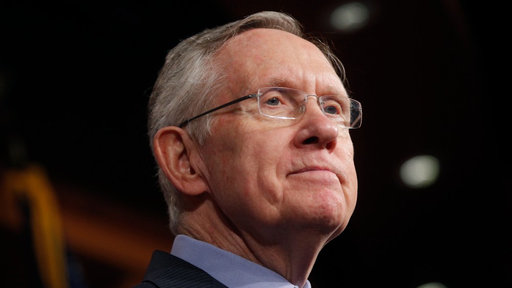 Senate Majority Leader Harry Reid of Nevada, listens to a reporter's question about their meeting with Senate Republicans regarding the government shutdown and debt ceiling on Capitol Hill in Washington on Saturday, Oct. 12, 2013.
