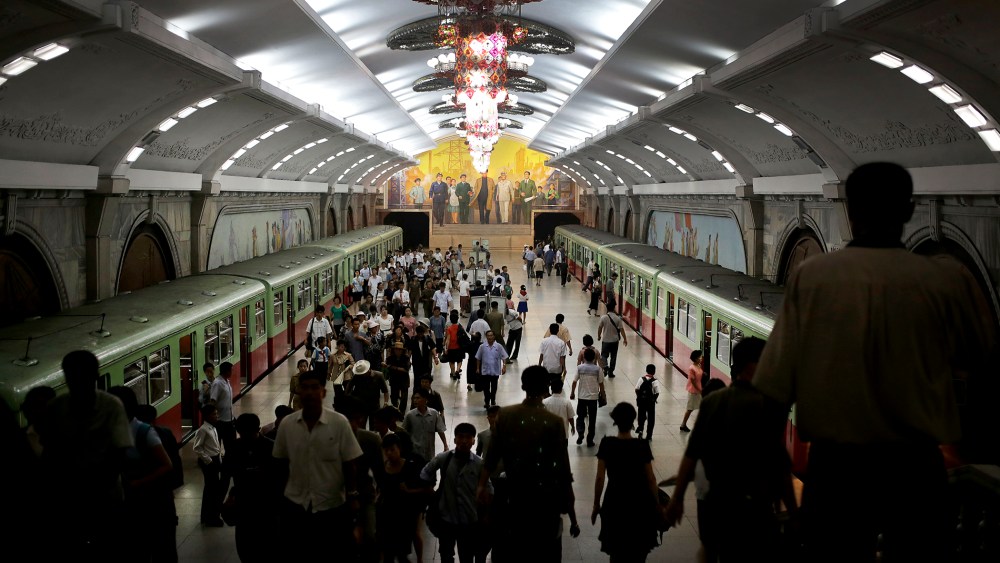 North Koreans make their way to and from a train platform in an underground subway station, Sept. 1, 2014 in Pyongyang, North Korea.