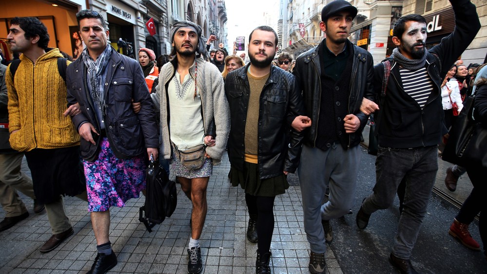 Men wear skirts to show solidarity with women who have been protesting against violence against women since the recent murder of Ozgecan Aslan, a 20-year-old woman, in Istanbul, Turkey, on Feb. 21, 2015. (Photo by Emrah Gurel/AP)