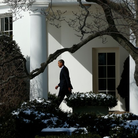 President Barack Obama walks from the Oval Office in Washington, March 5, 2014.