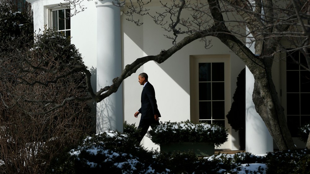 President Barack Obama walks from the Oval Office in Washington, March 5, 2014.