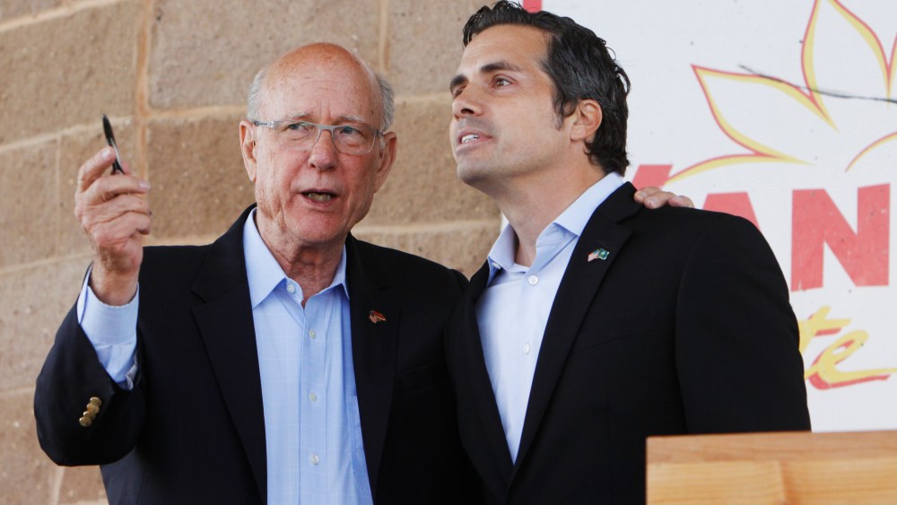 Sen. Pat Roberts, left, R-Dodge City, and Greg Orman, Independent for U.S. Senate, speak at the conclusion of their Senatorial Debate at the Kansas State Fair on Saturday, Sept. 6, 2014, in Hutchinson, Kan.