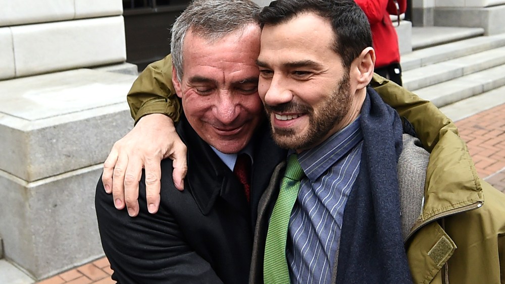 Louisiana plaintiffs, Havard Scott, left, and Sergio March embrace outside of the 5th U.S. Circuit Court of Appeals, Jan. 9, 2015, in New Orleans, La. (Photo by Stacy Revere/AP)