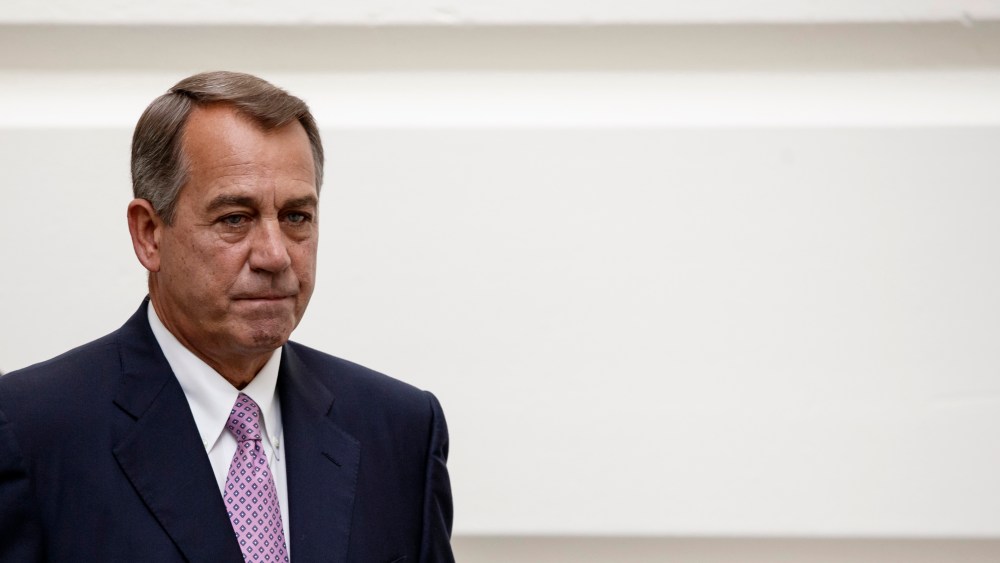 House Speaker John Boehner of Ohio walks to a Republican strategy session on Capitol Hill in Washington, Friday, Oct. 4, 2013.