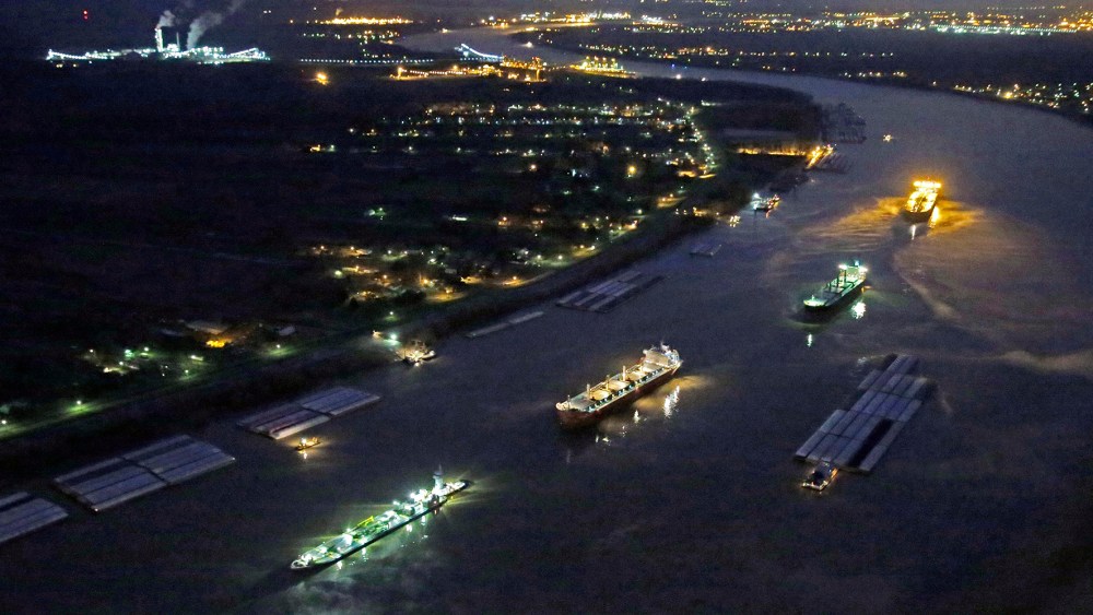 River traffic is halted along the Mississippi River between New Orleans and Vacherie, La., due to a barge leaking oil in St. James Parish, La., Feb. 23, 2014.