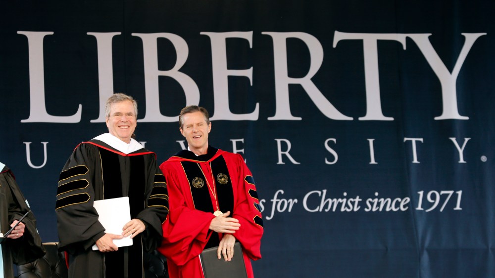 Former Florida Gov. Jeb Bush on stage with Liberty University president Jerry Falwell Jr. for commencement ceremonies in Williams Stadium in Lynchburg, Va., May 9, 2015. (Photo by Steve Helber/AP)