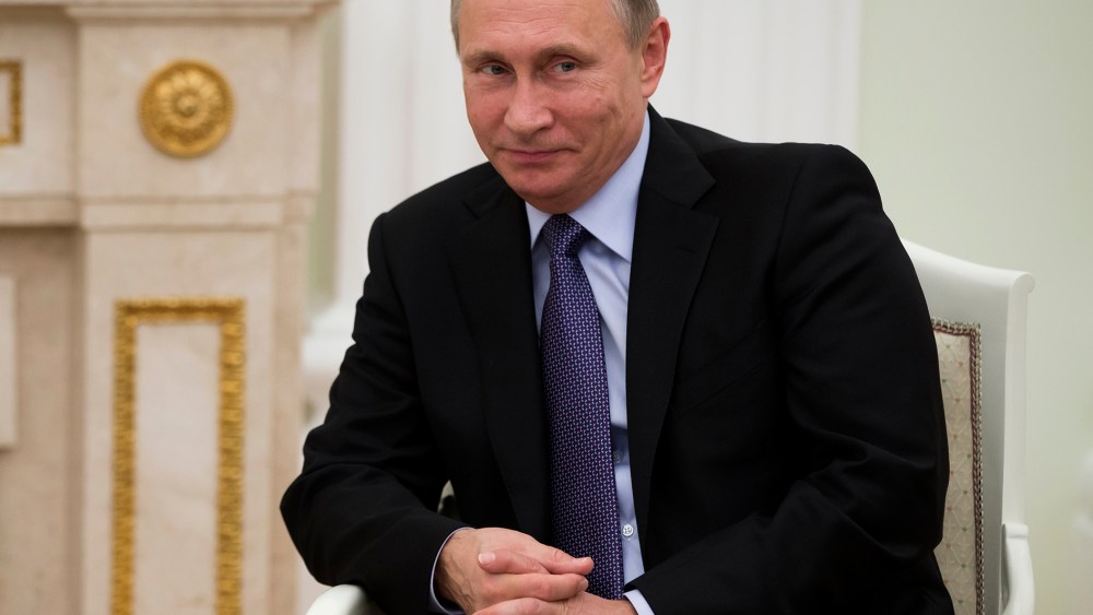 Russian President Vladimir Putin meets with Prince Albert II of Monaco in the Kremlin in Moscow, Russia, Oct. 21, 2015. (Photo by Pavel Golovkin/AP)