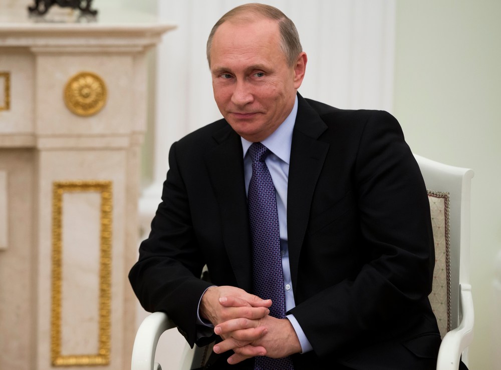 Russian President Vladimir Putin meets with Prince Albert II of Monaco in the Kremlin in Moscow, Russia, Oct. 21, 2015. (Photo by Pavel Golovkin/AP)