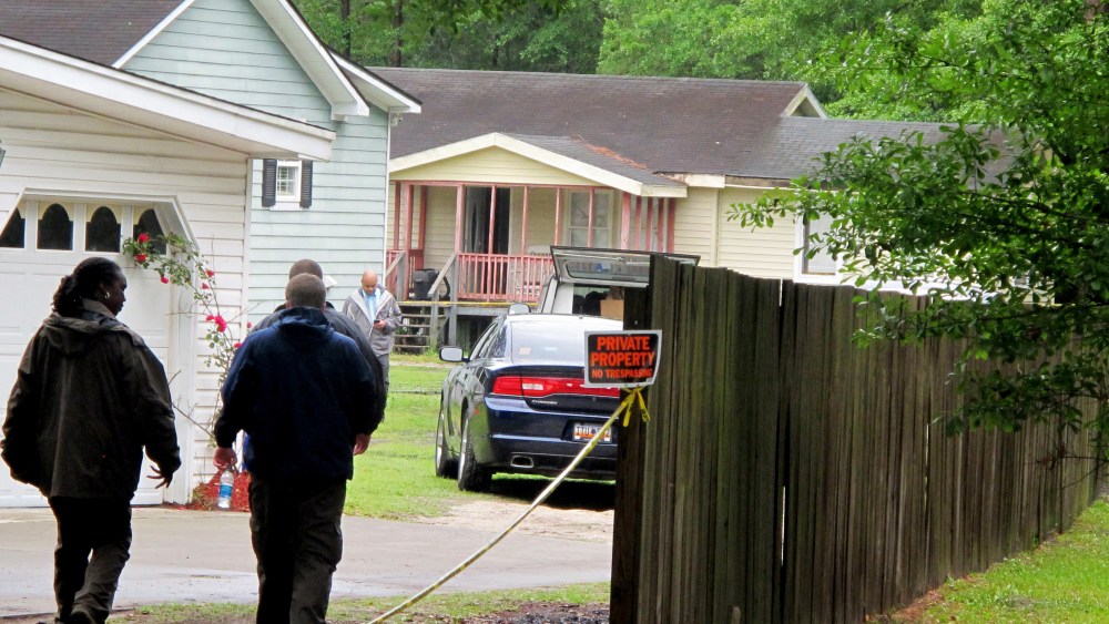 Investigators work at a scene of a shooting in Hollywood, SC., May 7, 2015. (Photo by Bruce Smith/AP)