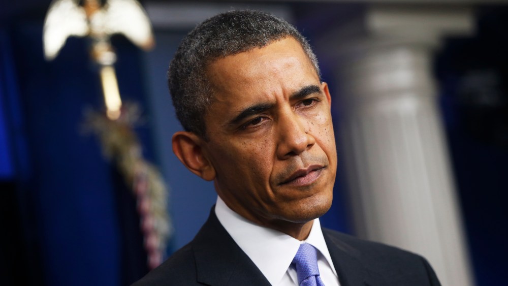 President Barack Obama listens to a question during his end-of-the-year news conference, Dec. 20, 2013.