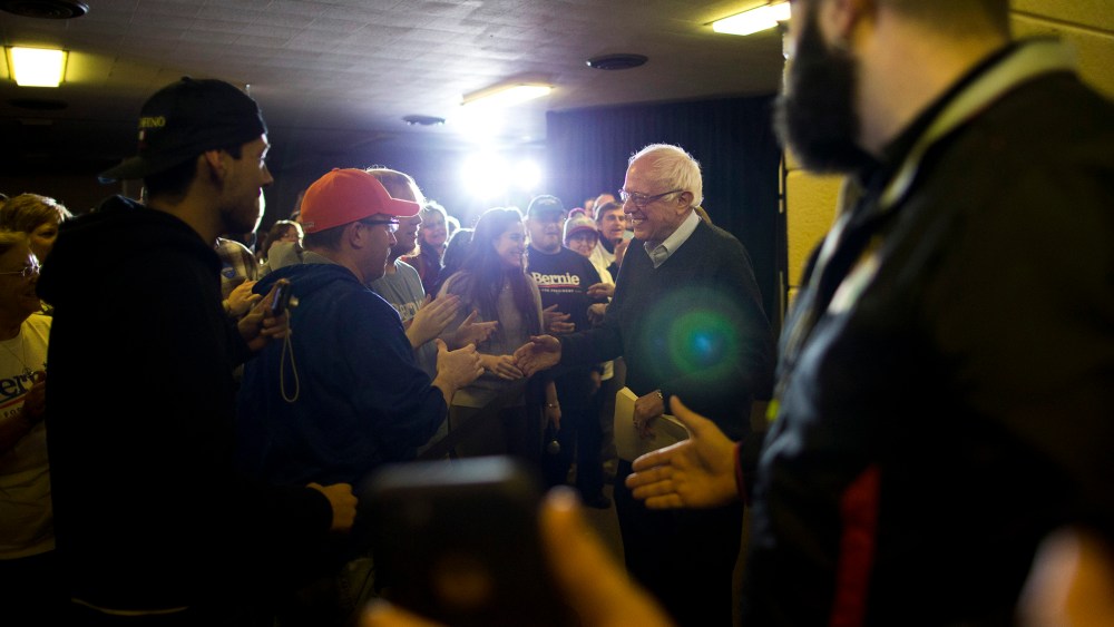 Democratic presidential candidate Sen. Bernie Sanders, I-Vt., shakes hands with supporters as he arrives at a campaign event, Jan. 23, 2016, in Clinton, Ia. (Photo by Jae C. Hong/AP)
