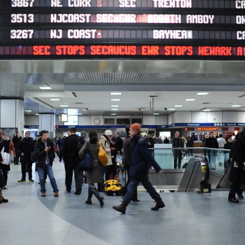 08 FEBRUARY 2013 - New York - Travelers in Penn Station wait around to see what trains are running as a winter Nor'Easter storm makes it's way through New York on February 8, 2013, New York, NY. Blizzard conditions are expected with high winds and snow...