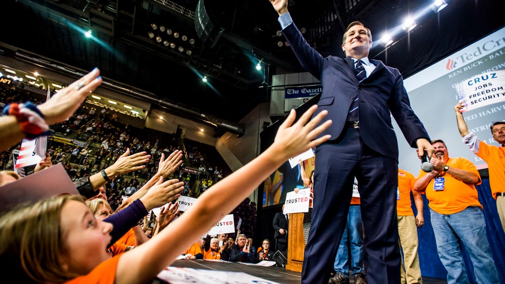 U.S. Sen. Ted Cruz waves to supporters after speaking at the Colorado State Republican Assembly at the Broadmoor World Arena on April 9, 2016, in Colorado Springs, Colo. (Photo by Stacie Scott/The Gazette/AP)
