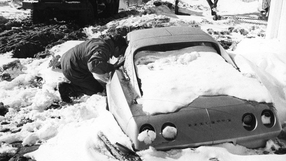 ** FILE ** ADVANCE FOR SUNDAY FEB. 2 ** A National Guardsman checks a stranded car Feb. 9, 1978, in Hampton, N.H., after the Blizzard of '78 to see if anyone was trapped inside. A winter storm combined with high tides flooded the New Hampshire seacoast...