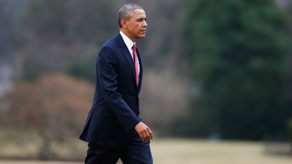 President Barack Obama walks on the South Lawn of the White House in Washington, Jan. 15, 2014.