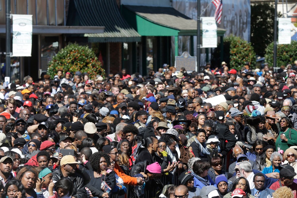 A large crowd forms near a stage where President Barack Obama will speak and then take a symbolic walk across the Edmund Pettus Bridge on March 7, 2015, in Selma, Ala. (Photo by Gerald Herbert/AP)