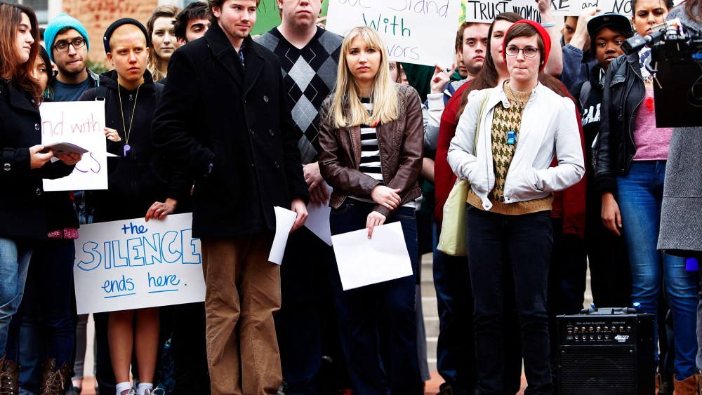 UNC-Chapel Hill students stand during a rally Friday March 1, 2013.